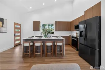 Neutral colored cabinets & modern stainless steel appliances