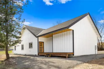 The back of the home features a spacious deck that extends the living area outdoors