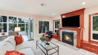 Next to the fireplace there are 2 very useful custom built storage features.