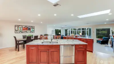 The island is spacious with a 4 spot eat bar and a double door Fisher and Paykel dishwasher Plus sky light