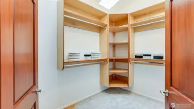 Nice sized walk-n closet with custom organizers.