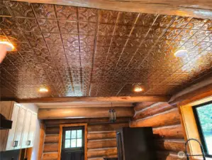 Copper colored tin ceiling