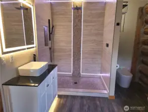 Custom tile work with LED's and rainfall shower