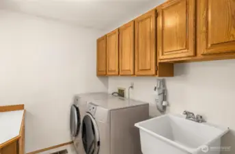 Laundry room on main with tons of storage!