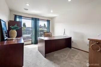 Private den with wet bar behind French doors