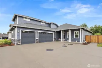 Immaculate modern home with 3-car garage and RV parking, elegant stone accents, and welcoming covered entry - blending style, function, and curb appeal in one perfect package.