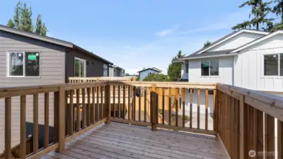 Main floor deck is perfect for relaxing and enjoying sunsets.