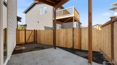 Back yard is fully fenced with access gate.