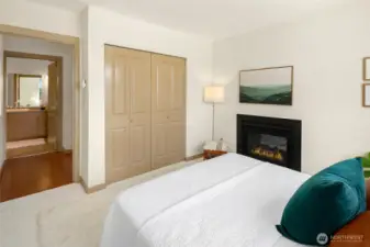 King sized bedroom captures Western views and the double sided gas fireplace, all new interior paint.