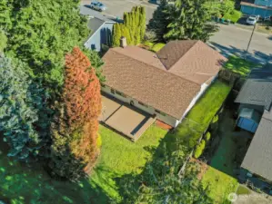 An aerial view showcases the lush grounds and the home’s expansive footprint.