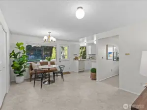 An expansive dining area offers the perfect setting for festive family dinners or cozy evenings with friends.