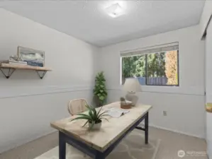 Secondary virtually staged bedroom or work from home office.