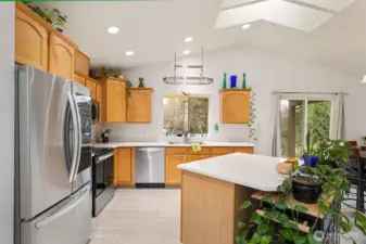Kitchen with center island and Quartz countertops