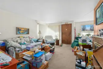 Living room looking at entrance door