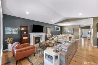 Views of the living and dining area from the sunroom entry