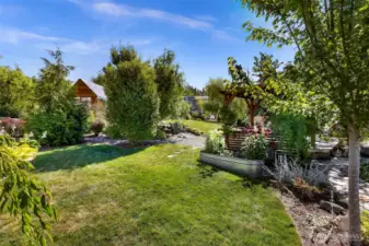 Spacious and meticulously maintained gardens throughout the property, this area is located just off the pergola, office and lower level ADU
