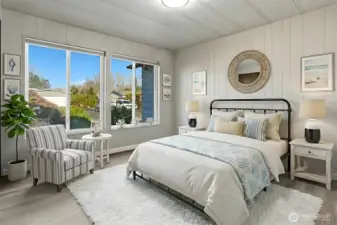 2nd bedroom with new LVP flooring - virtually staged photo