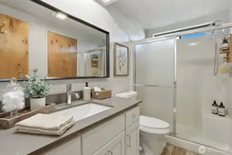 Updated hall bathroom - virtually staged photo