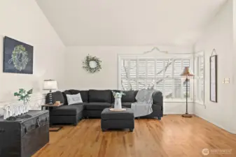 True Hardwood flooring throughout main floor and stairs creating nice uniformity.