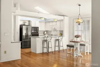 View from family room looking at kitchen.