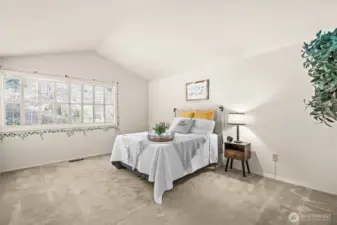 Windows allow natural light to shine and wood interior shutters work remarkably well to keep room nice and dark when sleeping in.