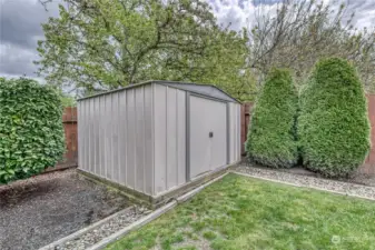 Handy storage shed for all of the outdoor tools.