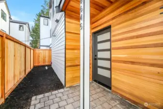 Private entry with fenced yard