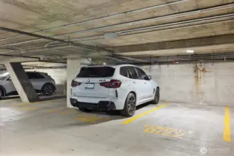 Experience the convenience and modernity of your designated garage parking spot, equipped with an electric car charging station. Whether or not you're a fan of Elon Musk, your car will love the ease of staying charged and ready to go. Embrace the future of driving with this seamless addition to your home, making eco-friendly living effortless and stylish.