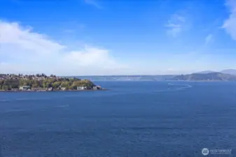 This is the breathtaking view you'll enjoy every day from your Seattle condo—stunning, inspiring, and invigorating. Imagine waking up to this panorama that’s exclusively yours, providing a daily dose of beauty and serenity in the heart of the city.
