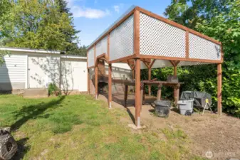 Large outdoor gazebo area with grill/fireplace