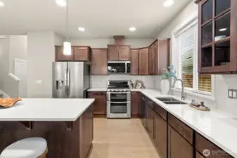 Kitchen features abundance of cabinets for storage of all your kitchen essentials.