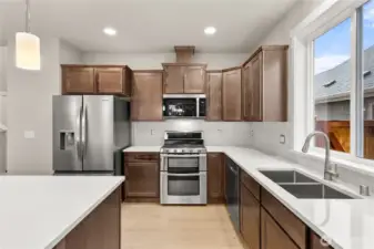 Kitchen features abundance of cabinets for storage of all your kitchen essentials.