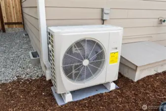 Heat pump providing both heat and cooling for year-round comfort.