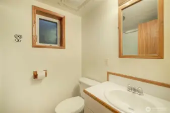 This full-sized bathroom is on the lower floor.
