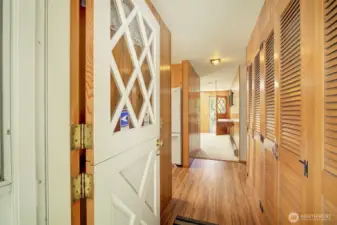 A charming Dutch door welcomes in homeowners and guests alike.