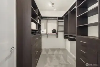 Primary bedroom walk in closet.