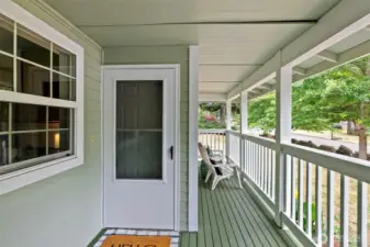 Cute covered front porch is perfect for relaxing.
