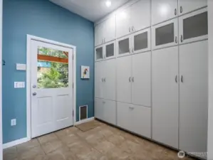 Mud room and pantry with built in storage.