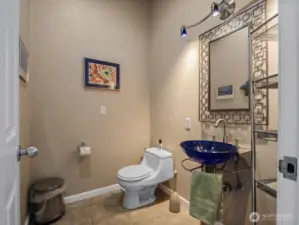 Main floor guest bath off of great room.