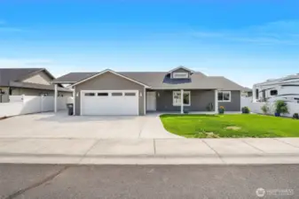 Extra wide driveway for parking.