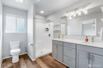Primary bath with dual sinks.