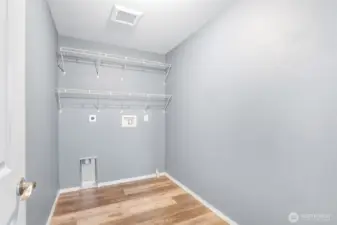 Separate laundry room.