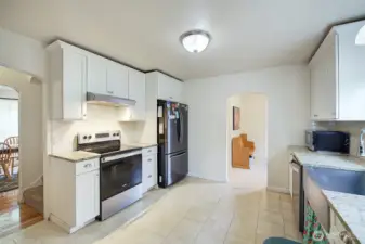 Kitchen is just off the dining room and a mud room with separate entrance.