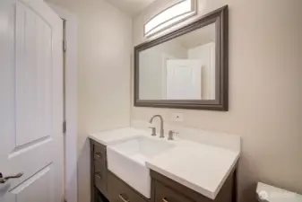 Main bath in main floor hallway.