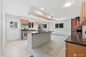 Shiny granite countertops, stainless appliances. Eating bar for four!