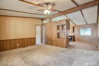 Family looking into dining and kitchen
