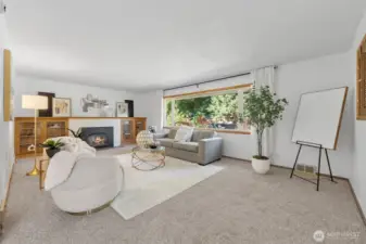 Cozy living room with original built-ins and a cozy gas fireplace.