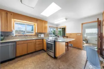 Updated kitchen with granite counters.