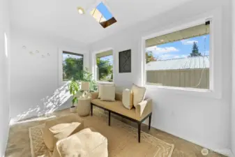 Private patio off of sunroom.