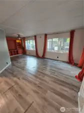 Family room with large windows with tons of natural light